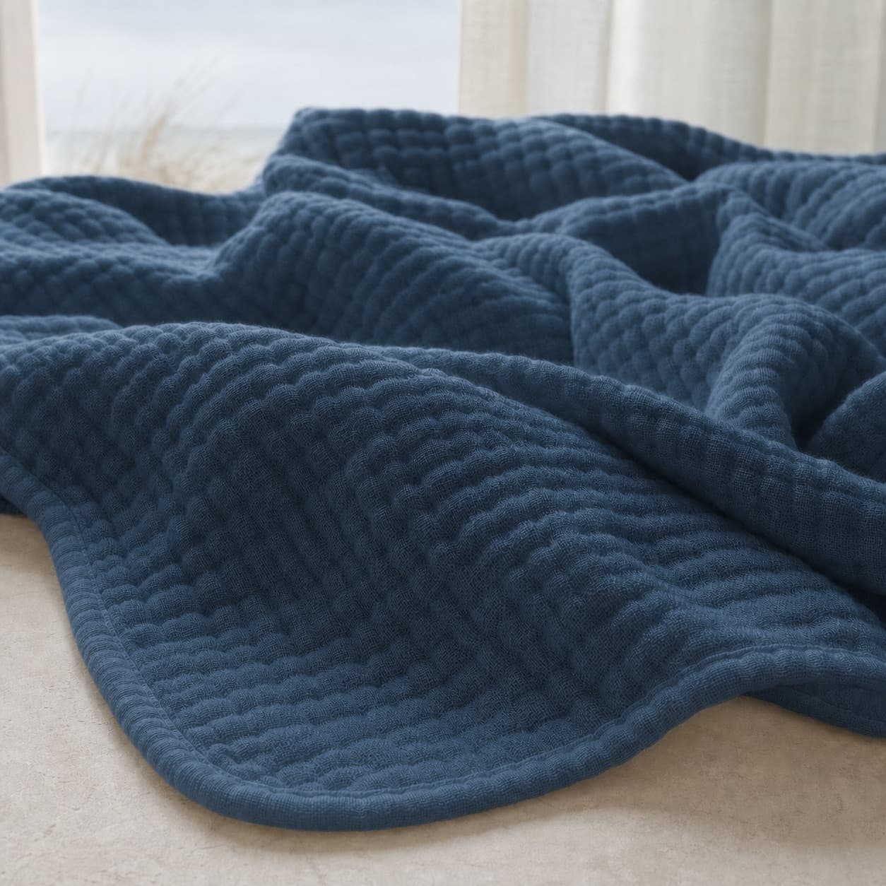 Close-up of the lightweight muslin blanket texture — Deep Navy